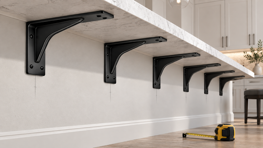Hidden countertop support brackets spaced evenly beneath a kitchen island overhang